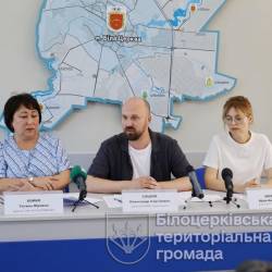 головна
